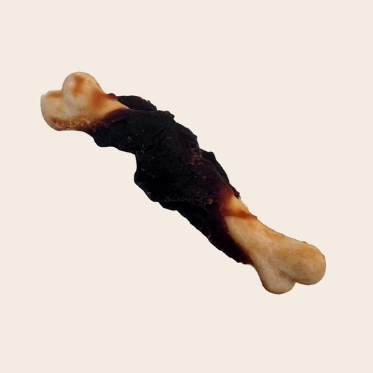 Os enveloppé dans du poulet 1 morceau.